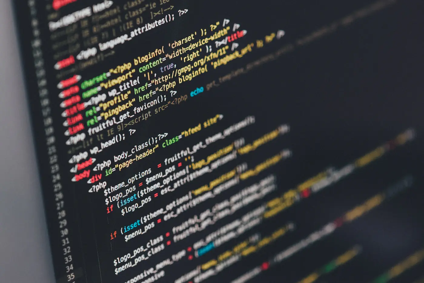 A developer working through code on a computer