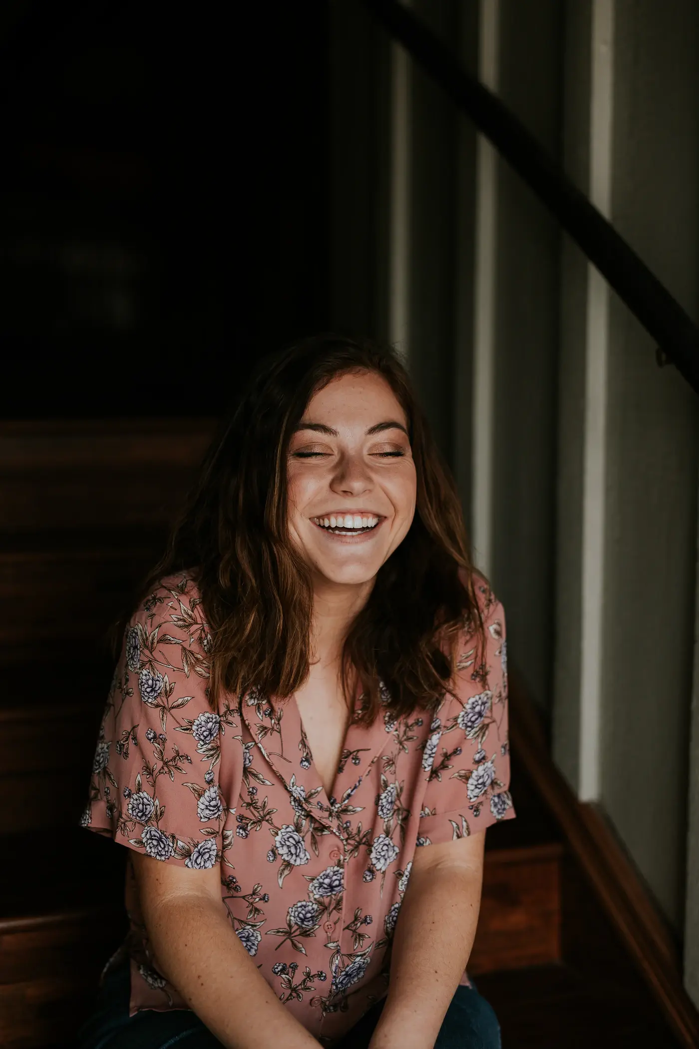 A smiling person representing friendly customer support
